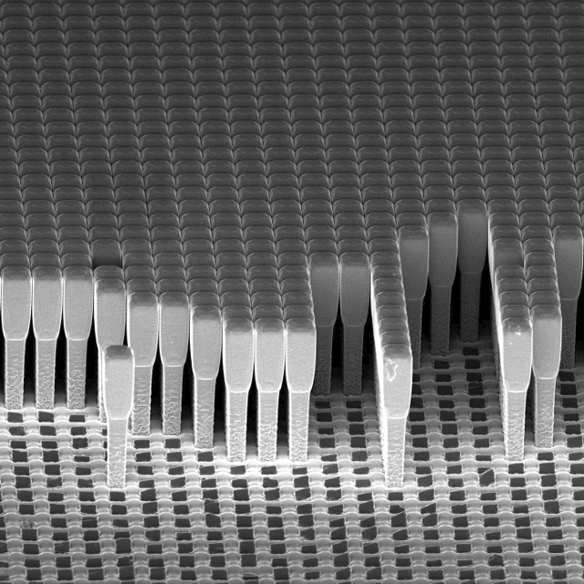 Enlarged view: Array of Ge crystals grown epitaxially on Si pillars. The array was obtained under conditions of self-limited lateral expansion of the crystals, thus preventing the latter to fuse and form a continuous film
